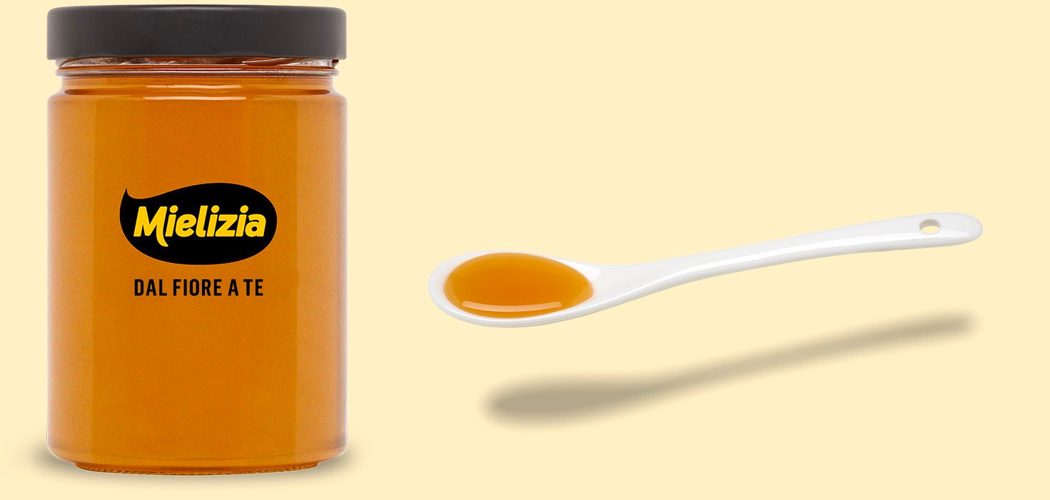 Glass jar of Mielizia Corbezzolo honey with brand label